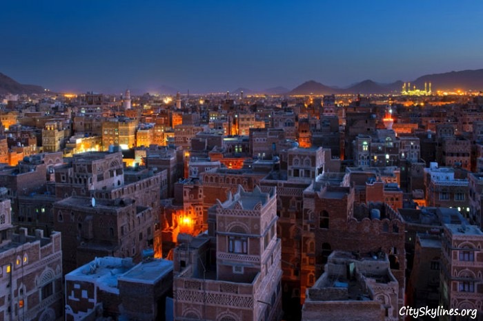 Sana’a City at Night, Building Top View with Mountain Backdrop